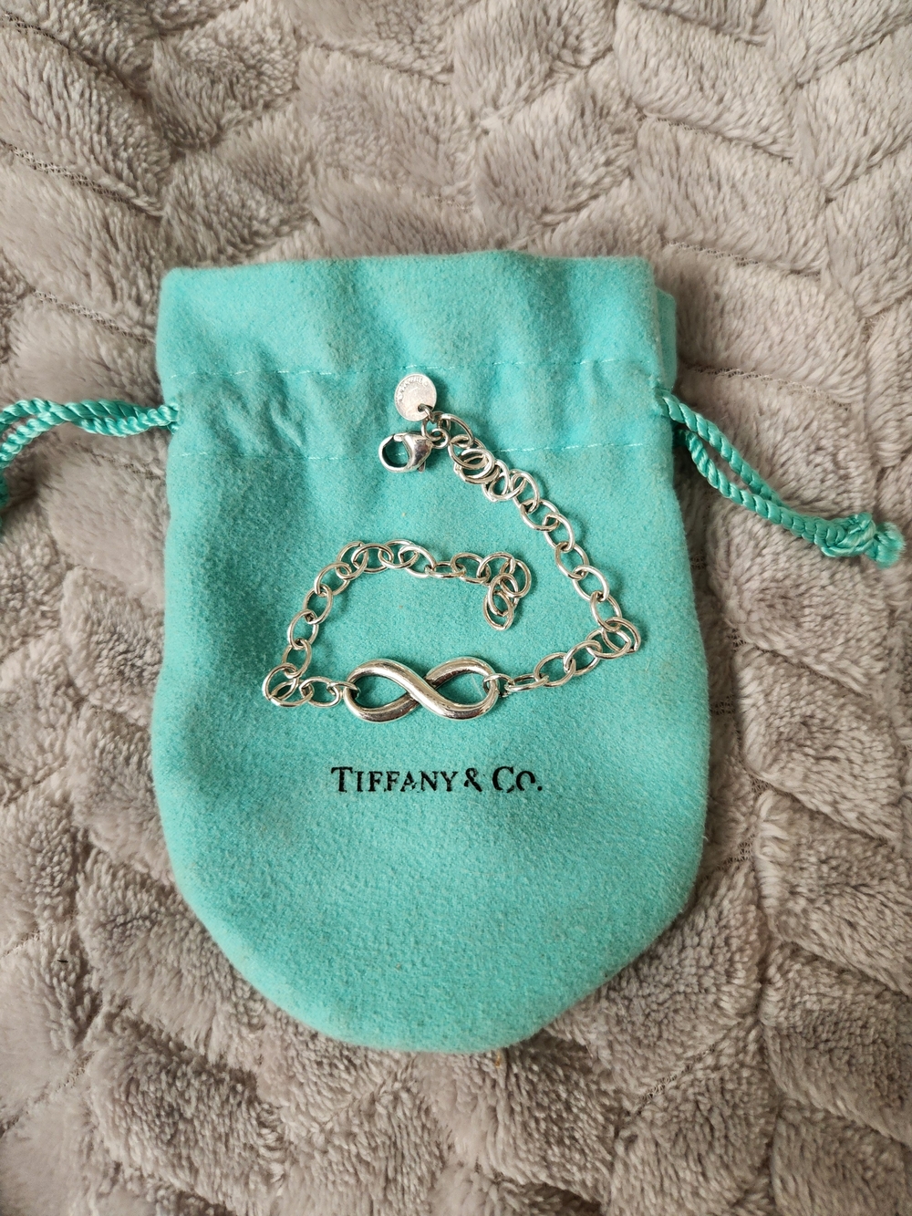Tiffany & Co. Silver Infinity Bracelet on Tiffany Blue Pouch